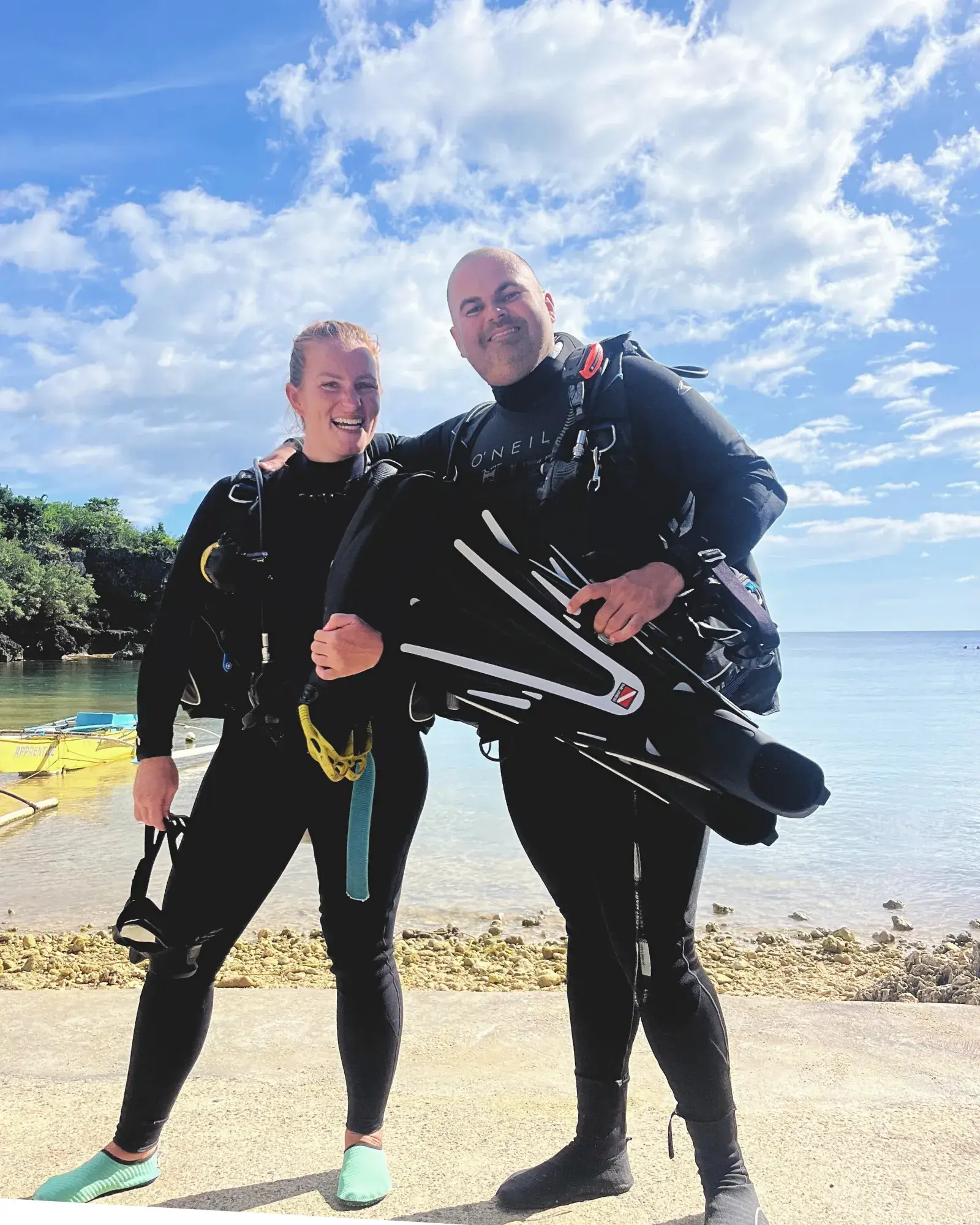 Beginner diver and her instructor in Siquijor, Philippines.