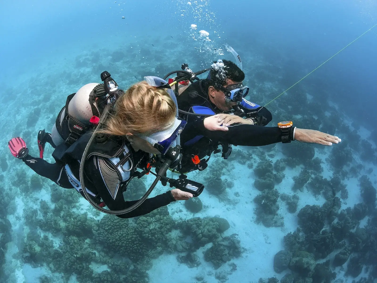 Underwater navigation with compass in Siquijor.